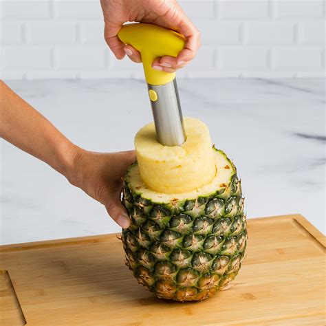 Step 1: Remove the top and bottom Lay the ripe pineapple on its side on a clean cutting board. Grab a sharp chef’s knife (not a serrated knife, which may release …